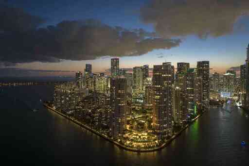aerial-view-downtown-district-miami-brickell-florida-usa-brightly-illuminated-high-skyscraper-buildings-modern-american-midtown