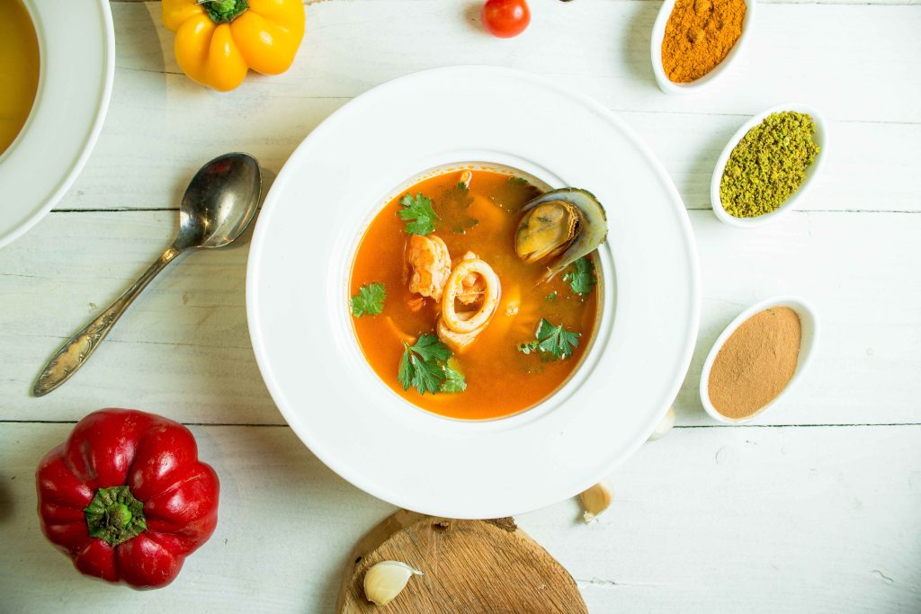 top-mussel-soup-with-tomato-herbs-white-bowl